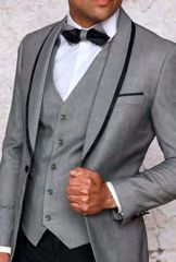 A person wearing the INSOMNIA SUNSET 3PC Slim Fit Grey Tuxedo Suit with a black bow tie stands against a light background.