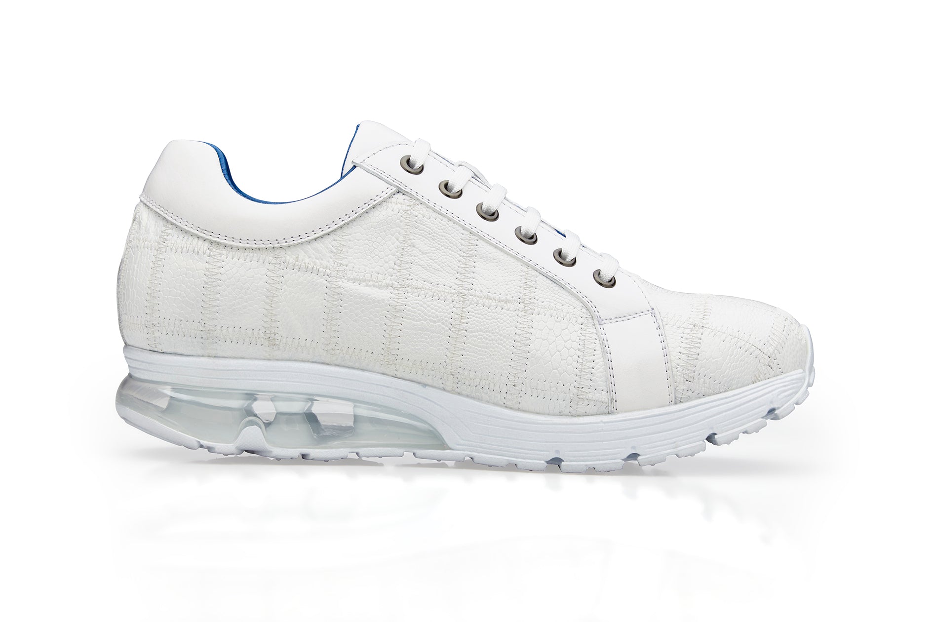 The Belvedere Magnus sneaker in white features a genuine ostrich patchwork design, lace-up front, and a transparent sole section, enhanced with a cushioned insole for extra comfort.