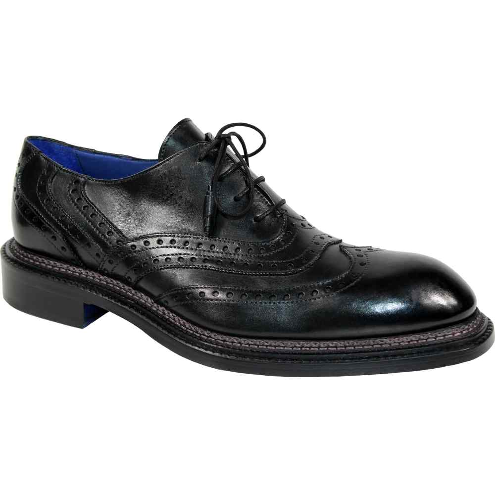 The Emilio Franco "Mattia" Black Shoes, from the Emilio Franco Artigiana collection, are skillfully crafted Italian brogues in black leather, adorned with decorative perforations and laces. These shoes feature a thick sole, offering a sophisticated presentation against a plain backdrop.