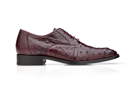 A side view of the Belvedere - Orlando dress shoe, crafted with genuine ostrich quill in antique dark burgundy and featuring a sleek leather sole, displayed on a white background.