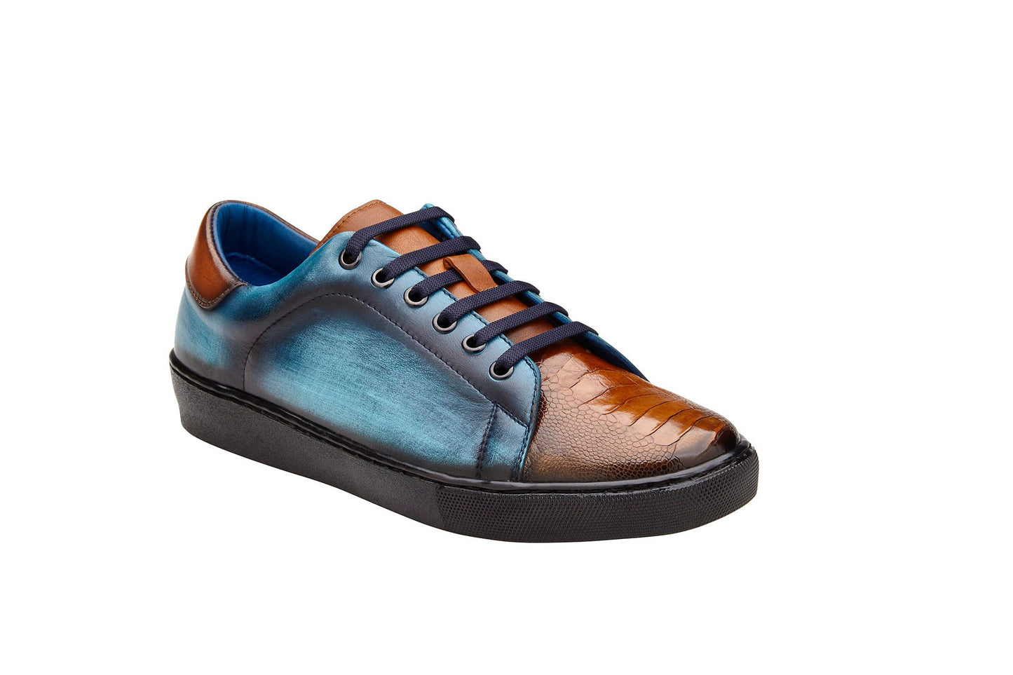 A stylish Belvedere sneaker in Antique Brandy and Antique Ocean Blue, made from genuine ostrich and soft Italian calf leather, showcasing a textured toecap, black sole, and tassel laces for added flair.