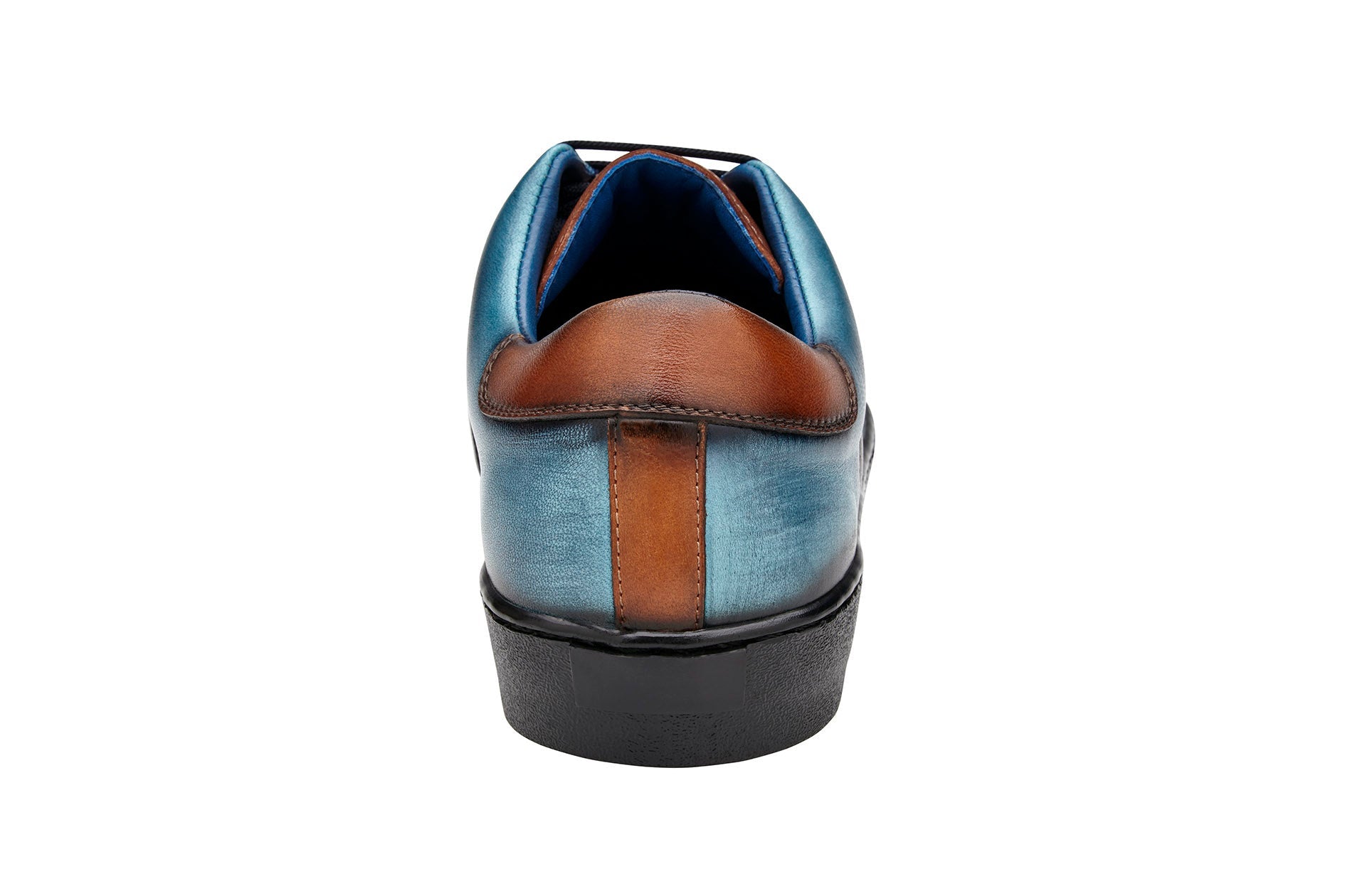 A stylish Belvedere sneaker in Antique Brandy and Antique Ocean Blue, made from genuine ostrich and soft Italian calf leather, showcasing a textured toecap, black sole, and tassel laces for added flair.