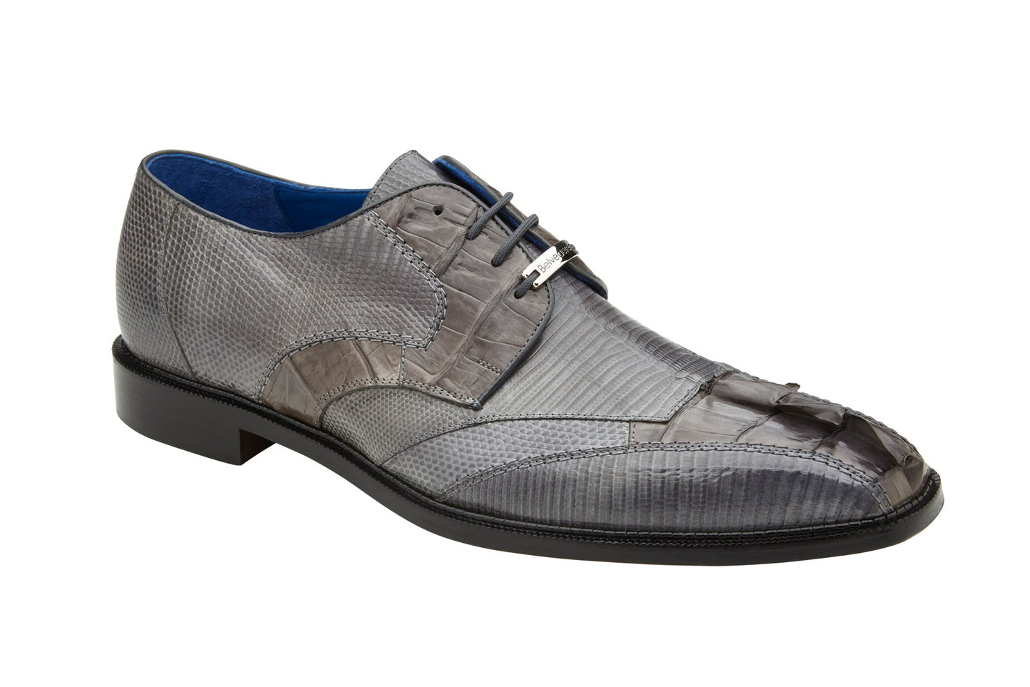 The Belvedere Valter is a Gray Genuine Caiman Crocodile and Lizard dress shoe with a textured pattern. It features a low heel, lace-up closure, and soft leather lining.