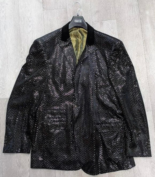 An Inserch Slim Fit Blazer 559-01 in black, designed with shimmering sequins and a velvet collar, elegantly drapes on the wooden floor—a true statement piece.