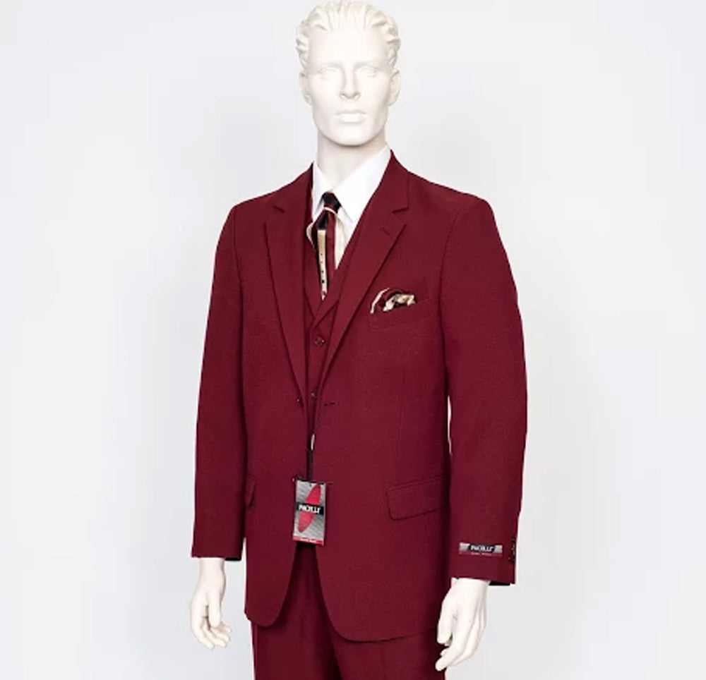 A mannequin exudes high fashion in the Pacelli 3pc Burgundy Suit CAMERON-10006, featuring a tie and pocket square with a tag gracefully hanging from the lapel. It's as if Italy's vibrant style whispers through every stitch, embodying the elegance that Pacelli is known for.