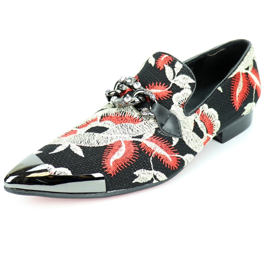 The FI-7253 Multi Fiesso by Aurelio Garcia from the Fiesso brand is a black leather loafer embellished with red and white floral embroidery. It boasts a shiny toe and is adorned with a decorative metal chain across the upper, making it perfect for those who value high fashion style.