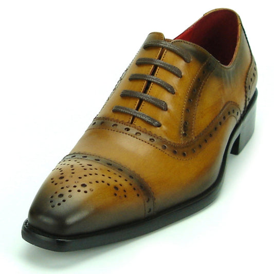 The FI-8713 Tan Lace up Fiesso by Aurelio Garcia fashion shoe features a tan leather upper with brogue detailing, dark laces, and a polished toe.