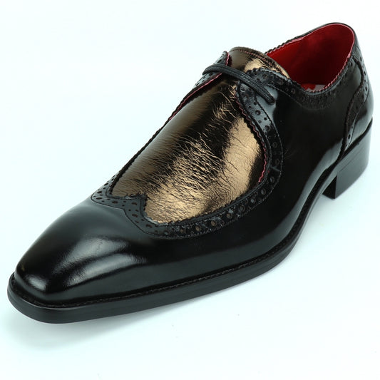 The FI-8704 Black Gold Encore by Fiesso is a stylish oxford shoe featuring a leather upper in elegant black and metallic bronze, decorative perforations, vibrant red lining, and a cushioned insole for enhanced comfort.