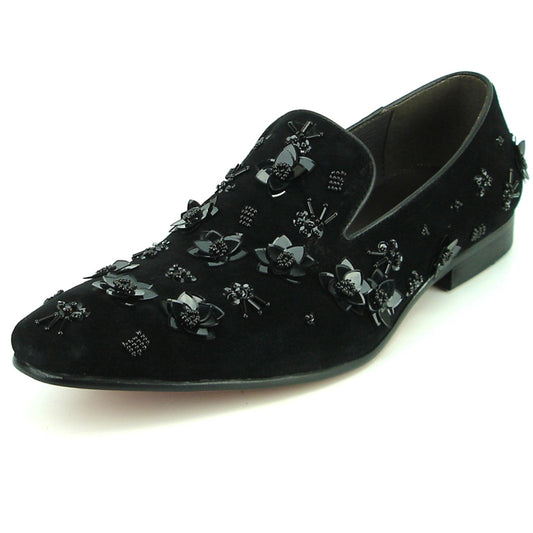 The FI-7272 Black Fiesso by Aurelio Garcia shoe features intricate 3D floral embellishments on black suede, delivering a unique touch of elegance. As part of the Fiesso collection, it seamlessly combines contemporary style with classic sophistication.