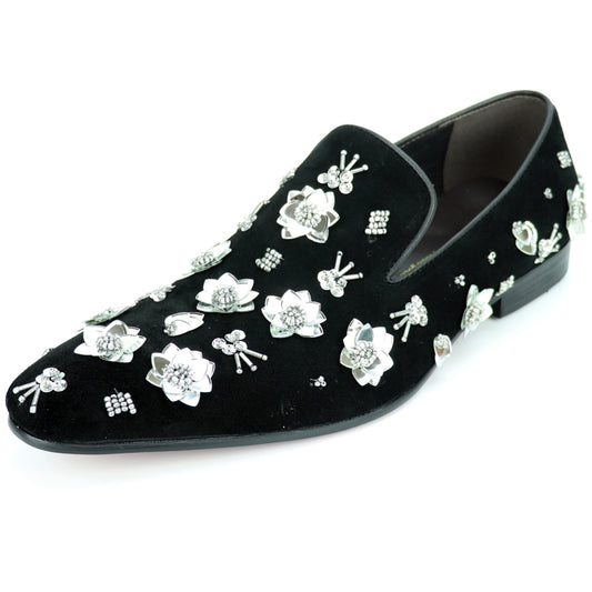 The FI-7272 Black Silver Fiesso by Aurelio Garcia, a stylish creation from Fiesso, is a black velvet loafer adorned with silver floral and gemstone embellishments and enhanced with a leather lining for added comfort.