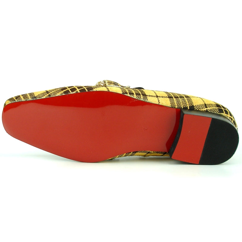 The FI-7291 Black Yellow Pony Hair Fiesso by Aurelio Garcia from the Fiesso brand features a fashionable loafer design with a decorative gold chain across the top, accentuated by its striking yellow and brown plaid pattern.