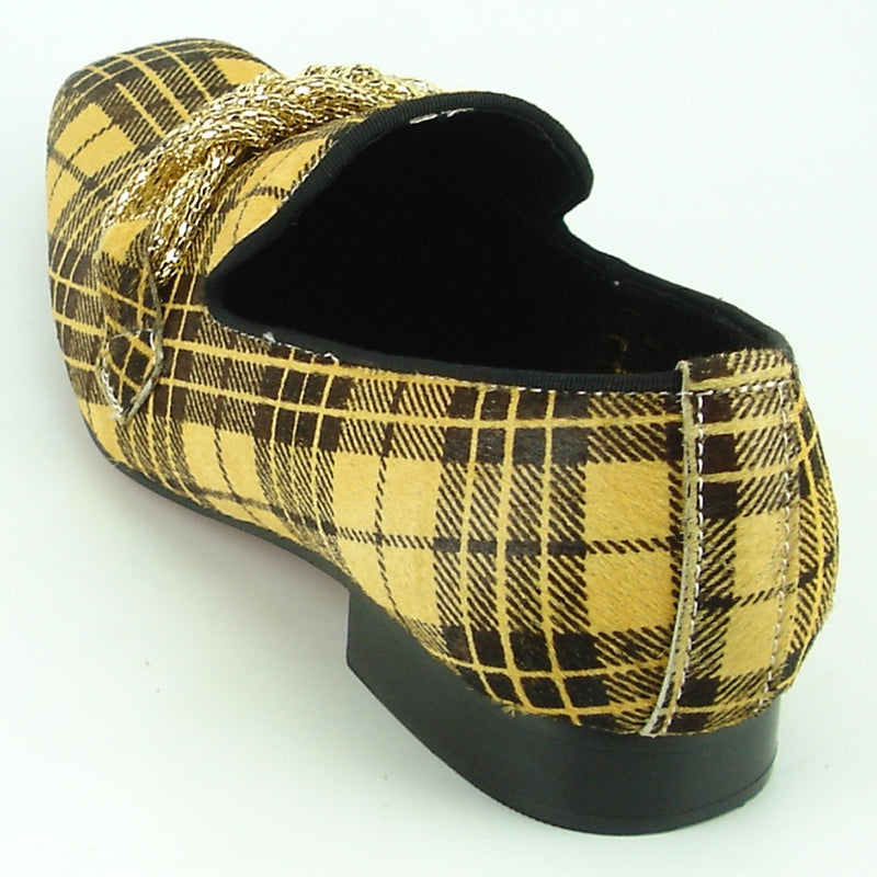 The FI-7291 Black Yellow Pony Hair Fiesso by Aurelio Garcia from the Fiesso brand features a fashionable loafer design with a decorative gold chain across the top, accentuated by its striking yellow and brown plaid pattern.