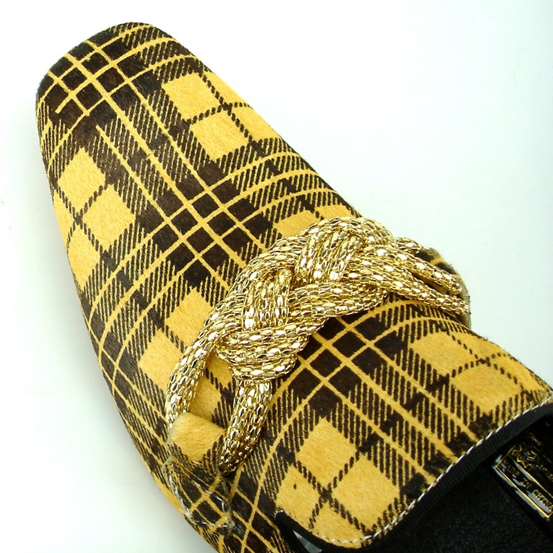 The FI-7291 Black Yellow Pony Hair Fiesso by Aurelio Garcia from the Fiesso brand features a fashionable loafer design with a decorative gold chain across the top, accentuated by its striking yellow and brown plaid pattern.