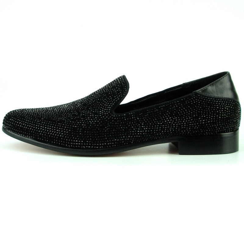 Introducing the FI-7285-A Black Fiesso by Aurelio Garcia, a chic fashion shoe from the renowned brand Fiesso. This elegant slip-on boasts a suede upper embellished with small, dazzling rhinestones and is thoughtfully designed with a low heel for effortless style.