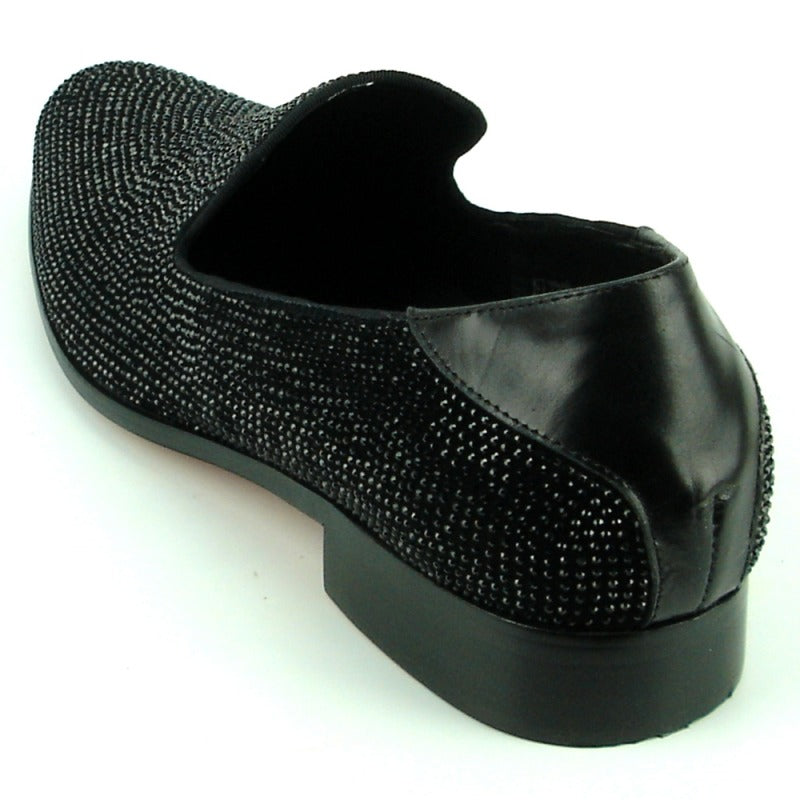 Introducing the FI-7285-A Black Fiesso by Aurelio Garcia, a chic fashion shoe from the renowned brand Fiesso. This elegant slip-on boasts a suede upper embellished with small, dazzling rhinestones and is thoughtfully designed with a low heel for effortless style.