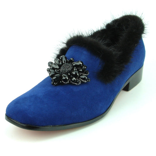 Introducing the FI-7306 Blue Suede Fiesso by Aurelio Garcia, a chic fashion shoe characterized by its low heel and adorned with a sophisticated black fur trim and a decorative black gem flower on the front. The elegant suede upper complements the comfortable cushioned insole, offering both style and comfort.