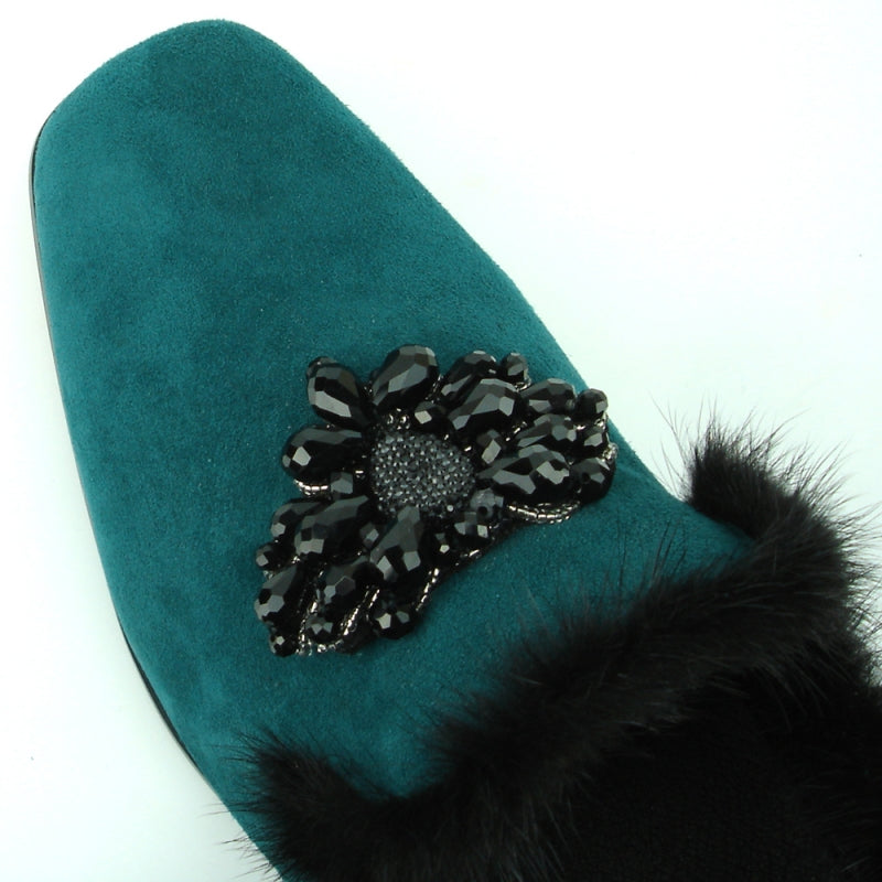 The FI-7306 Green Suede shoe by Fiesso showcases a luxurious black fur trim and a decorative black beaded floral design, making it the perfect fashion shoe for any stylish occasion.