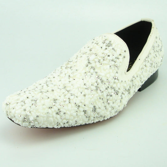 The FI-7317 White Fiesso by Aurelio Garcia from Fiesso is a fashionable shoe loafer, highlighted with elegant white and silver embellishments on a pristine background, and featuring a sleek leather upper for an effortless style.