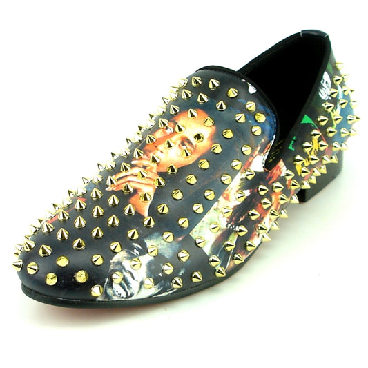 The FI-7338 Bob Print Fiesso by Aurelio Garcia slip-on fashion shoe, presented by Fiesso, is a black design embellished with gold spikes and printed images, featuring a cushioned insole for both comfort and style.