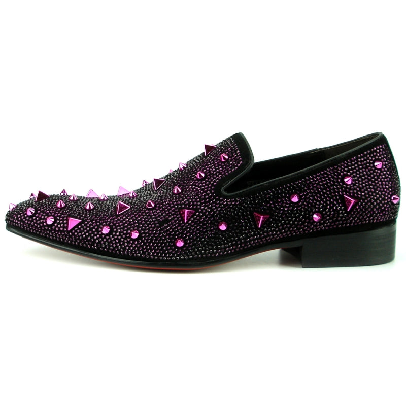 The FI-7364-R Black/Purple Fiesso by Aurelio Garcia from Fiesso is a stylish fashion shoe featuring a chic black suede upper adorned with shiny purple studs and spikes. It boasts a low heel and slip-on design for easy wear.