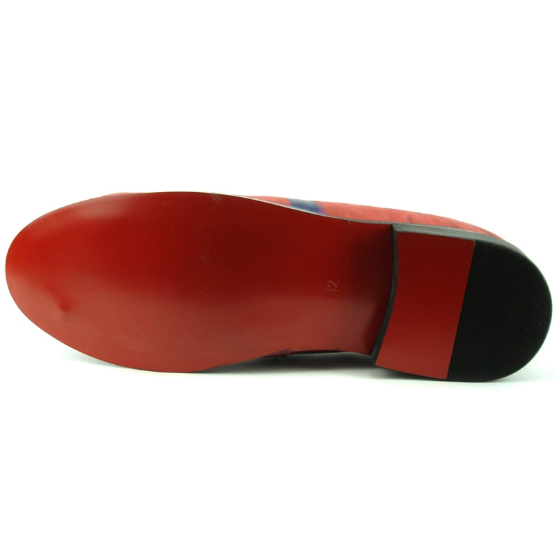 The FI-7367 Red Slip on Fiesso by Aurelio Garcia fashion shoe, with a leather upper in red adorned with blue abstract patterns and a black sole, is shown from a rear angle.