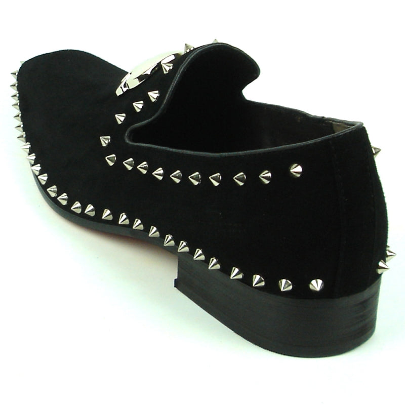 The FI-7199 Black Suede Fiesso by Aurelio Garcia shoe from the Fiesso brand is embellished with sharp spikes and features a shiny silver skull decoration on top.