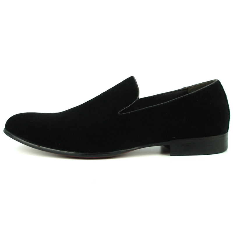 The FI-7216 Black Suede Fiesso by Aurelio Garcia, a slip-on loafer from Fiesso, combines style and comfort with its sleek design, featuring a black suede upper, low heel, and rounded toe.