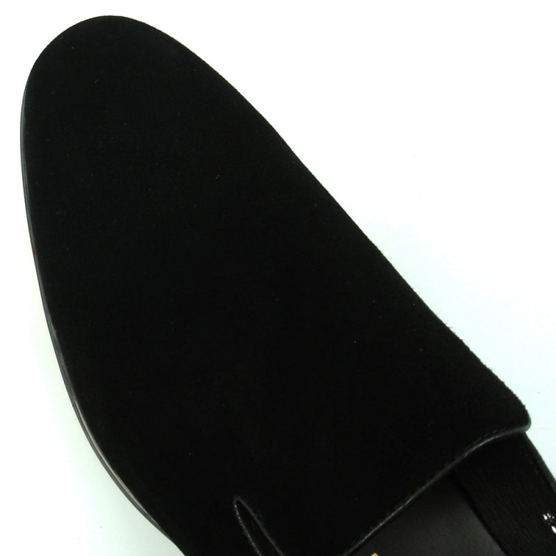 The FI-7216 Black Suede Fiesso by Aurelio Garcia, a slip-on loafer from Fiesso, combines style and comfort with its sleek design, featuring a black suede upper, low heel, and rounded toe.