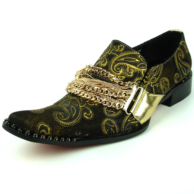 The FI-7322 Gold Chain Leather Shoes by Fiesso feature a black leather upper adorned with elegant gold paisley patterns, a metallic gold buckle, chain decoration, and a sleek pointed toe that completes the low-heel design.