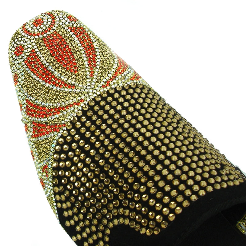 The FI-7328 Black Fiesso by Aurelio Garcia is a black fashion shoe from Fiesso with a suede upper. It features gold and red rhinestones arranged in a floral pattern on the toe and has a studded design throughout, offering comfort with its cushioned insole.