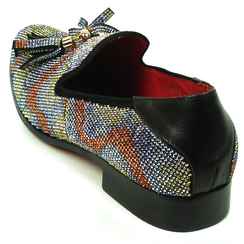 Introducing the FI-7390 Multi Color Fiesso by Aurelio Garcia from Fiesso: This stylish loafer boasts a multicolored, textured design with a suede upper and is adorned with tassel and bead accents. It features a vibrant red interior, a low black heel, and offers exceptional comfort thanks to its cushioned insole.