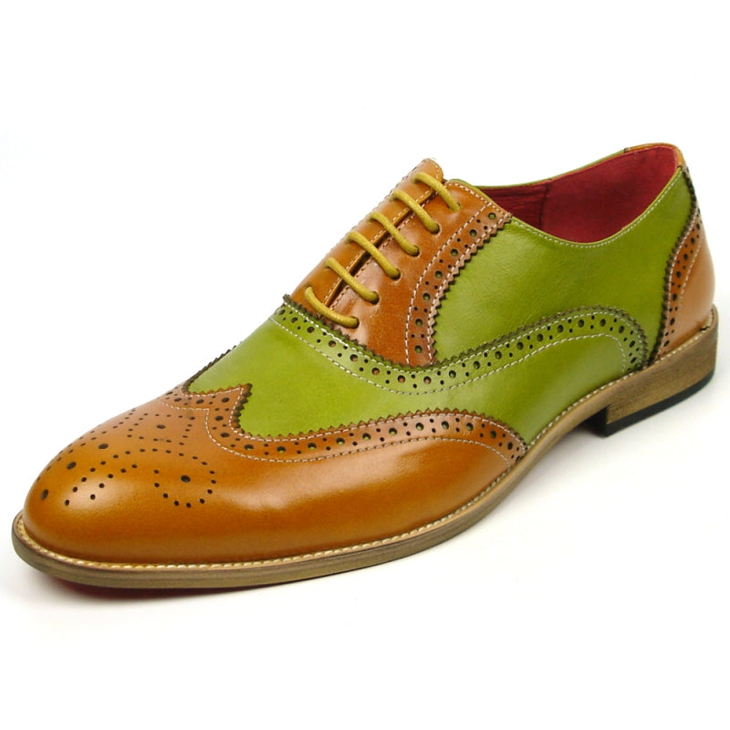 The FI-7400 Tan Green Wing Tip Lace Up by Fiesso showcases a leather upper adorned with brown and green panels, intricate decorative perforations, and sophisticated brown laces.