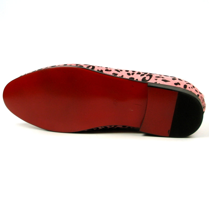 The FI-7402 Black Pink Leopard Fiesso by Aurelio Garcia, from the brand Fiesso, is a striking loafer featuring a pink leopard print with black tassels and a vibrant red interior. Designed as a slip-on leather fashion shoe, it offers ultimate comfort with its cushioned insole while making a bold statement that seamlessly blends style and practicality.