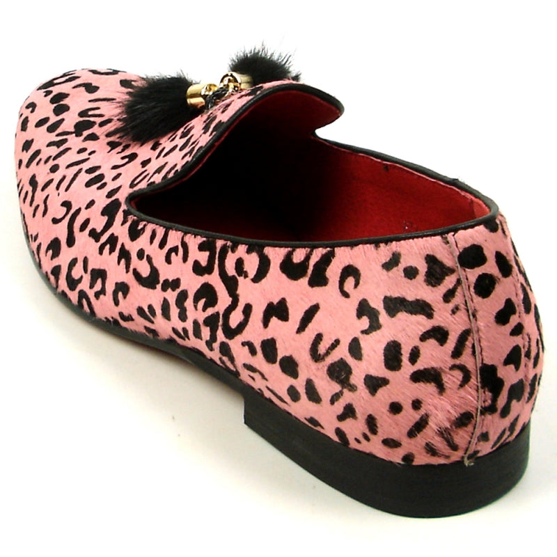 The FI-7402 Black Pink Leopard Fiesso by Aurelio Garcia, from the brand Fiesso, is a striking loafer featuring a pink leopard print with black tassels and a vibrant red interior. Designed as a slip-on leather fashion shoe, it offers ultimate comfort with its cushioned insole while making a bold statement that seamlessly blends style and practicality.