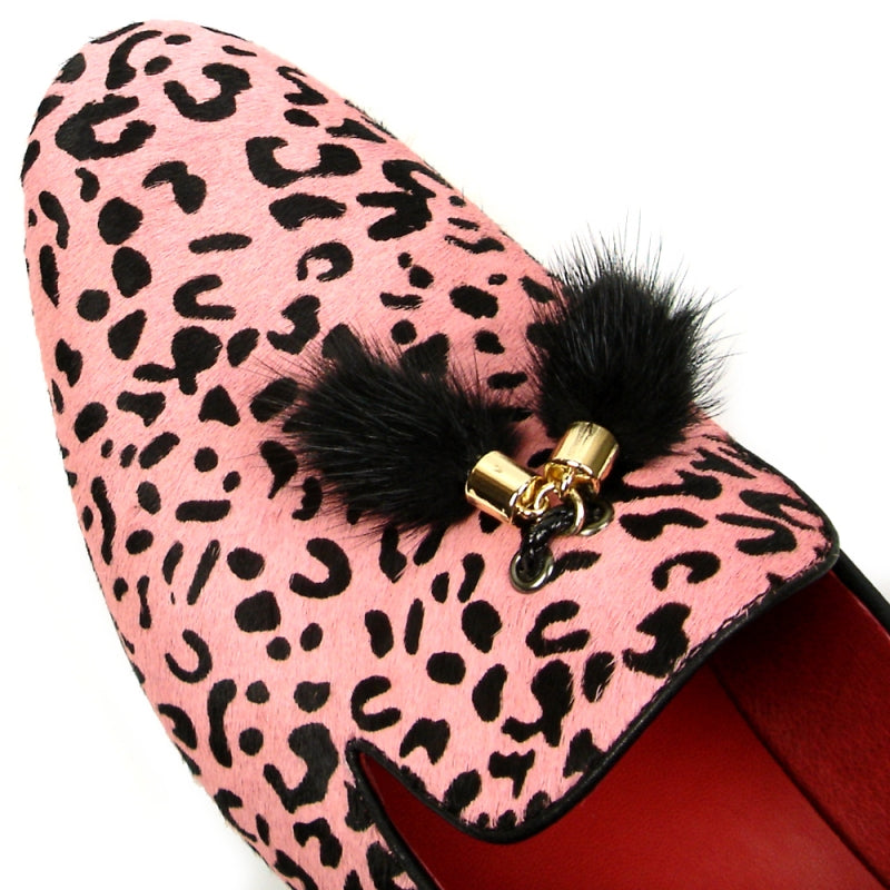 The FI-7402 Black Pink Leopard Fiesso by Aurelio Garcia, from the brand Fiesso, is a striking loafer featuring a pink leopard print with black tassels and a vibrant red interior. Designed as a slip-on leather fashion shoe, it offers ultimate comfort with its cushioned insole while making a bold statement that seamlessly blends style and practicality.