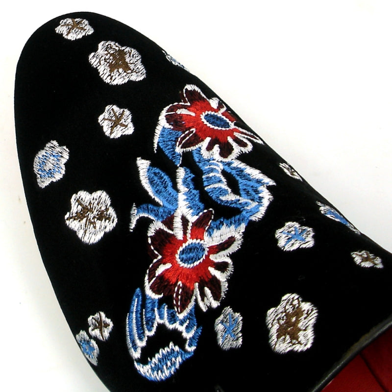 A black slip-on fashion shoe with a velvet upper, showcasing an elegant floral design by Fiesso, product name FI-7413.