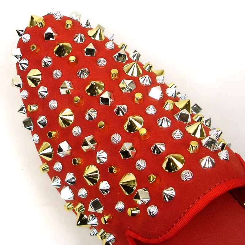 The FI-7418 Red Suede Gold/Silver Studs Sandal by Fiesso offers a bold look with its luxurious red suede upper adorned with striking gold and silver studs and spikes.