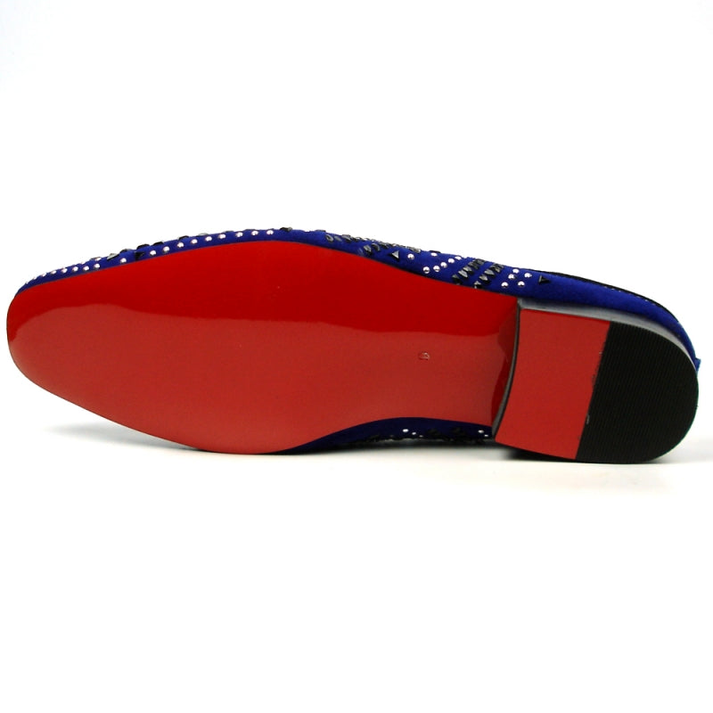 The FI-7420 Blue Suede Fiesso by Aurelio Garcia fashion shoe is a blue slip-on with a suede upper, embellished with an eye-catching concentric pattern of black and silver studs on the exterior, and showcasing a bold red interior.