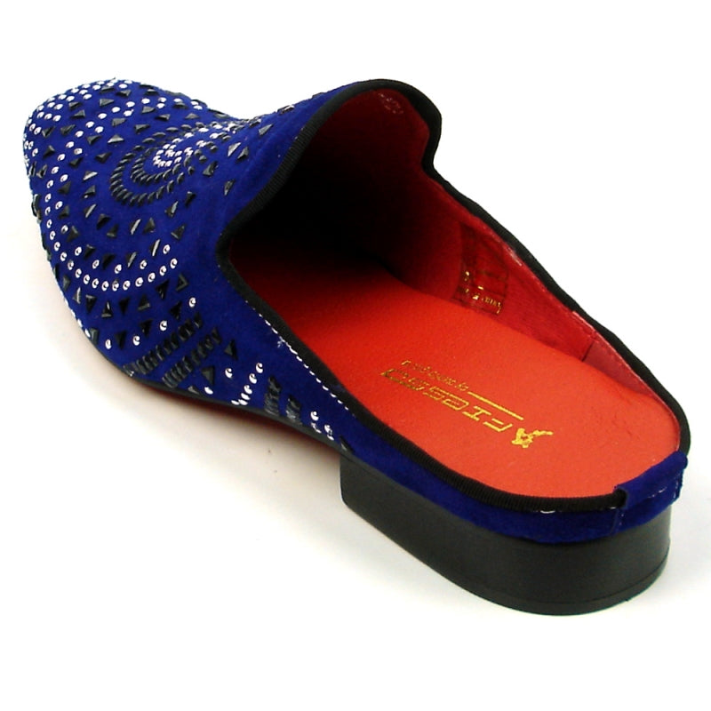 The FI-7420 Blue Suede Fiesso by Aurelio Garcia fashion shoe is a blue slip-on with a suede upper, embellished with an eye-catching concentric pattern of black and silver studs on the exterior, and showcasing a bold red interior.