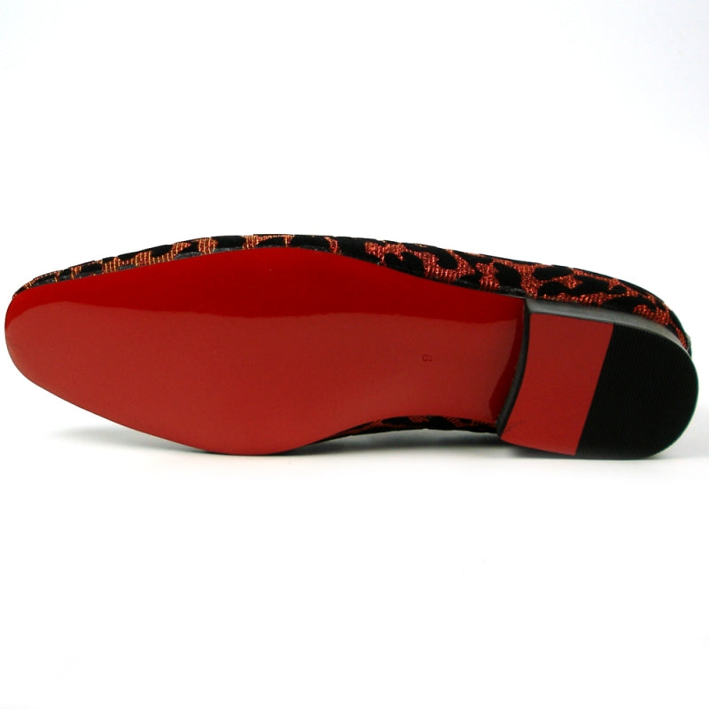 The FI-7422 Leopard Slip on Fiesso by Aurelio Garcia from the brand Fiesso showcases a striking red and black leopard print pattern, adorned with multicolored gem embellishments at the top. Its velvet upper exudes luxury, while the cushioned insole guarantees comfort with every step.