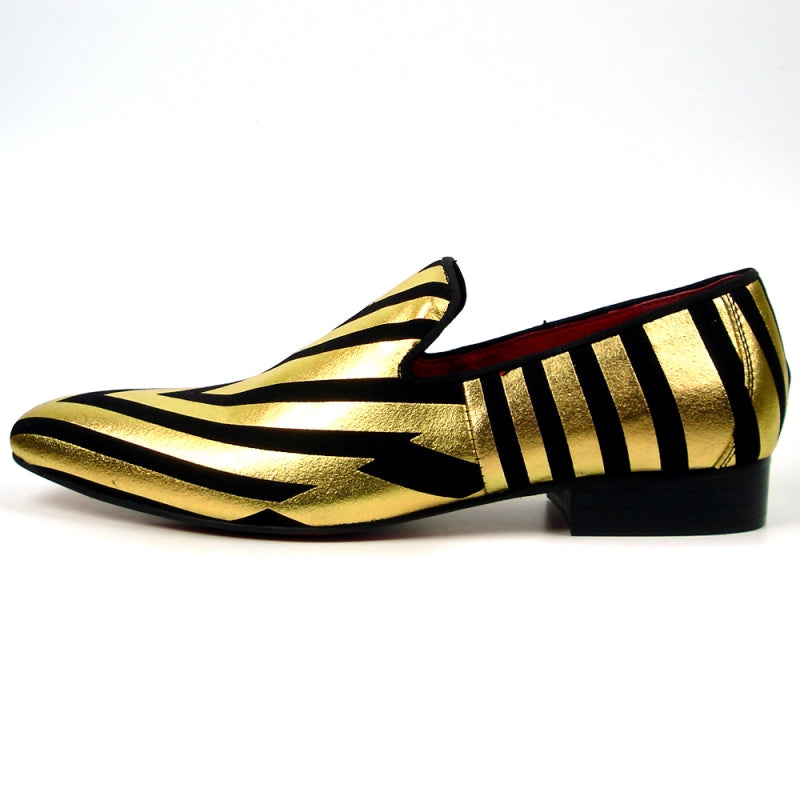 Fiesso offers the FI-7429 Black Gold Stripes shoe by Aurelio Garcia, showcasing a leather upper with a gold and black stripe design, a low heel, and an eye-catching red interior.