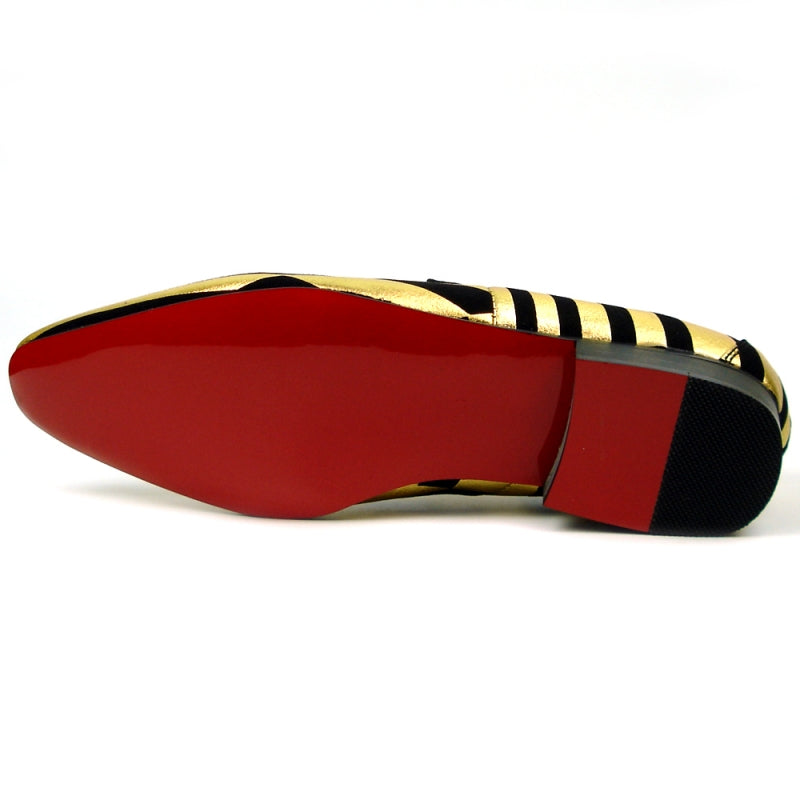 Fiesso offers the FI-7429 Black Gold Stripes shoe by Aurelio Garcia, showcasing a leather upper with a gold and black stripe design, a low heel, and an eye-catching red interior.