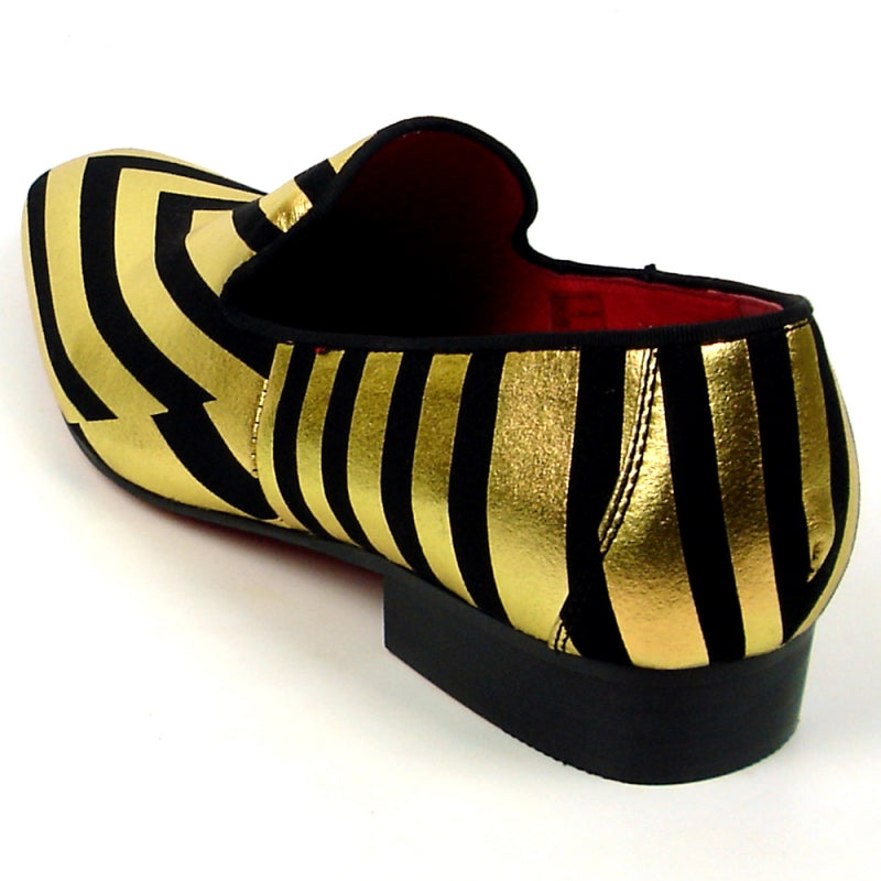 Fiesso offers the FI-7429 Black Gold Stripes shoe by Aurelio Garcia, showcasing a leather upper with a gold and black stripe design, a low heel, and an eye-catching red interior.