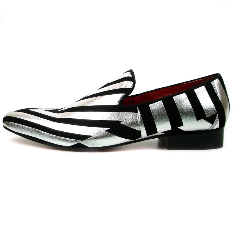 Introducing the FI-7429 Black Silver Stripes Fiesso by Aurelio Garcia, a stylish fashion shoe from Fiesso. This piece showcases a sleek black and silver striped design, complemented by a striking red interior and a comfortable low heel. Its premium leather upper and cushioned insole provide both elegance and support for ultimate comfort.