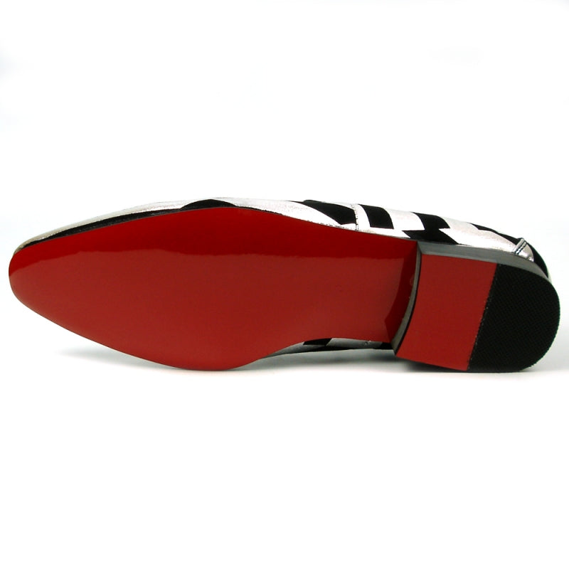 Introducing the FI-7429 Black Silver Stripes Fiesso by Aurelio Garcia, a stylish fashion shoe from Fiesso. This piece showcases a sleek black and silver striped design, complemented by a striking red interior and a comfortable low heel. Its premium leather upper and cushioned insole provide both elegance and support for ultimate comfort.