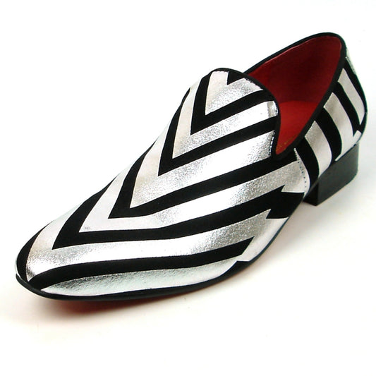 Introducing the FI-7429 Black Silver Stripes Fiesso by Aurelio Garcia, a stylish fashion shoe from Fiesso. This piece showcases a sleek black and silver striped design, complemented by a striking red interior and a comfortable low heel. Its premium leather upper and cushioned insole provide both elegance and support for ultimate comfort.