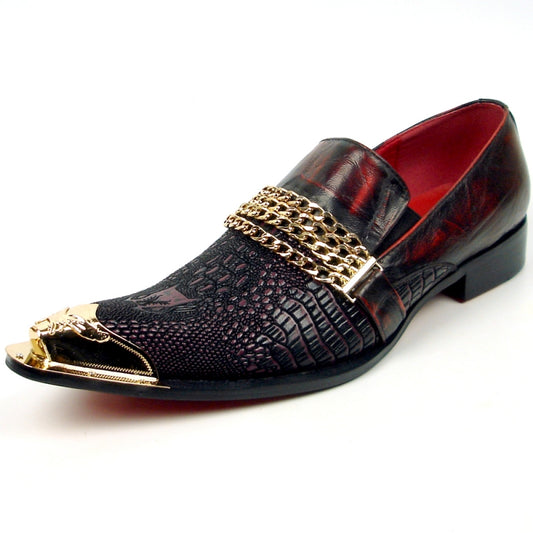 Introducing the FI-7435 Burgundy Metal Tip Fiesso by Aurelio Garcia, a sophisticated men's loafer from the Fiesso brand. It features a textured pattern with gold chain embellishment and a pointed metallic toe cap. This stylish fashion shoe offers a comfortable slip-on leather design with a cushioned insole, all set against a clean white background.