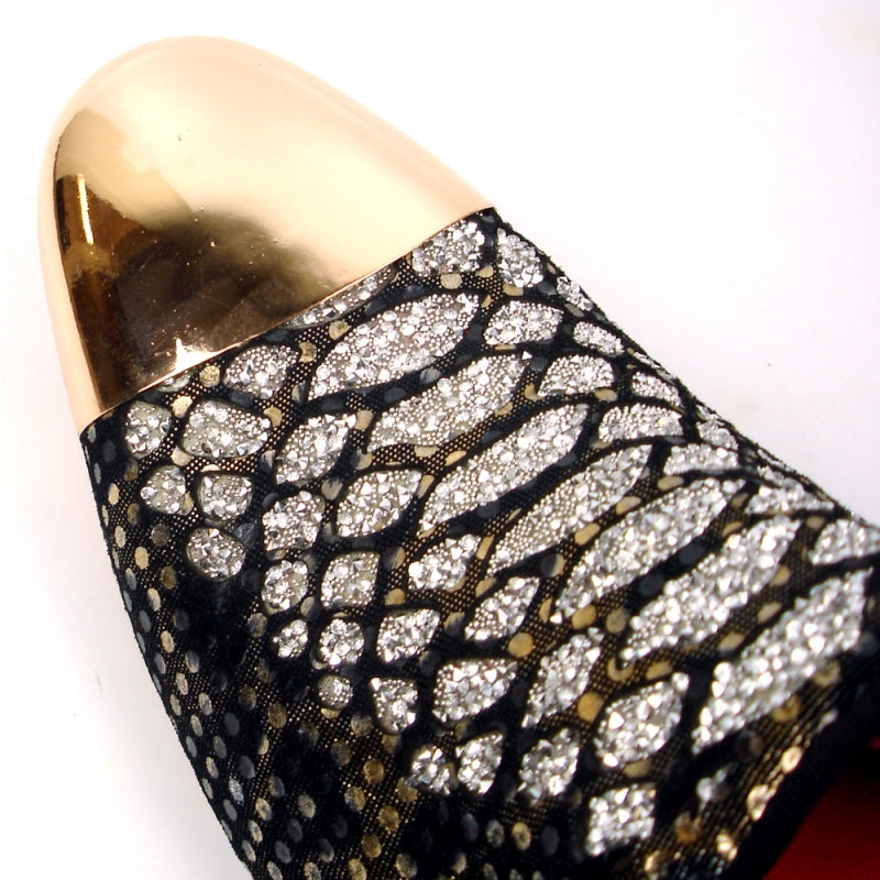 The FI-7447 fashion shoe by Fiesso boasts a black slip-on style featuring a gold metallic toe and a glittery, patterned leather upper, offering a stylish option from Aurelio Garcia.