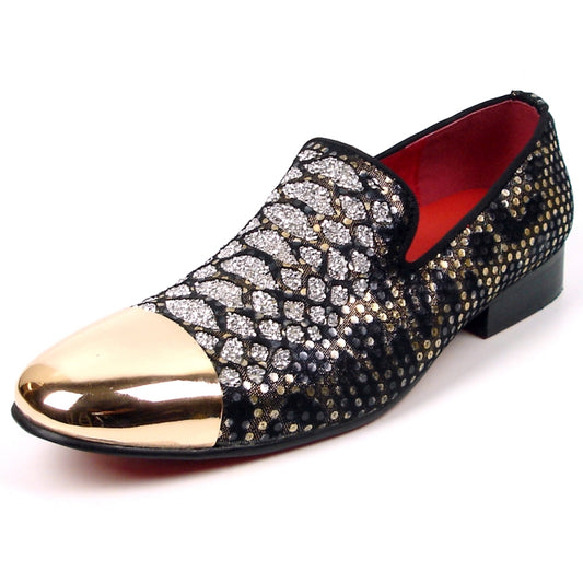 Product Description: The FI-7447 Multi Color Gold Metal Tip Fiesso by Aurelio Garcia from the Fiesso brand is a stunning fashion shoe, adorned with black and gold sequins and featuring a striking gold metallic toe cap. Designed for comfort, it has a low heel and a cushioned insole, presented elegantly against a white background.