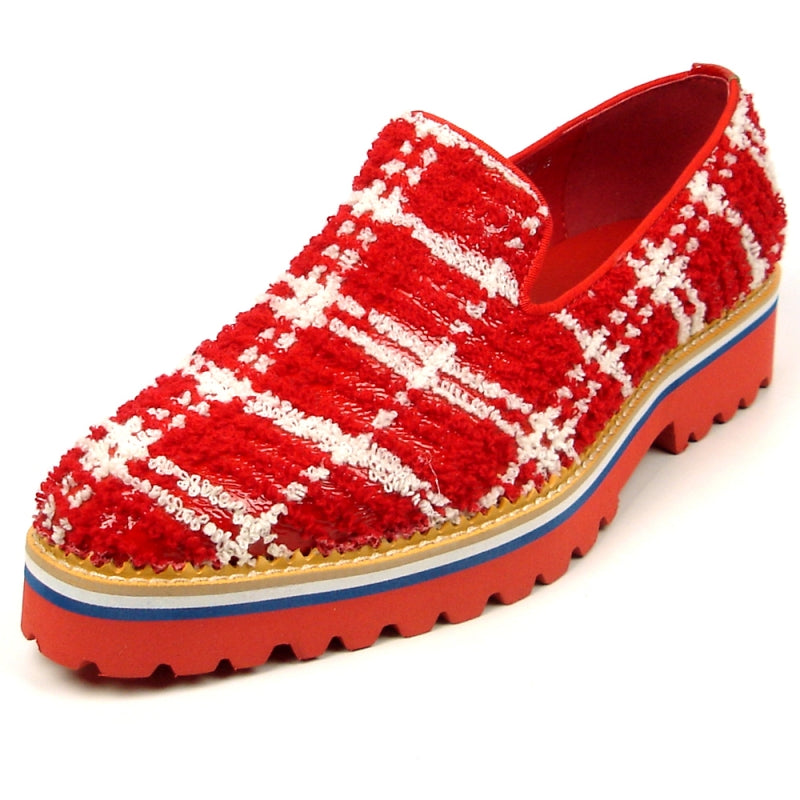 The FI-7452 Red Slip-On Fiesso by Aurelio Garcia is a fashion shoe that showcases a red and white plaid texture, complemented by a chunky red sole, blue trim, and leather upper.